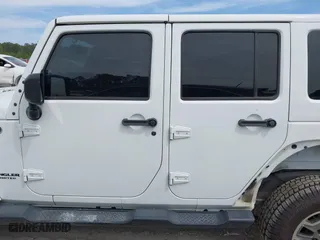 2015 Jeep Wrangler Unlimited Rubicon Hard Rock with VIN 1C4HJWFG7FL684057, listed as a IAAI auction lot 41963885 with 103,240 mi miles. Bid and sale history available at carsss.com. Image 14.