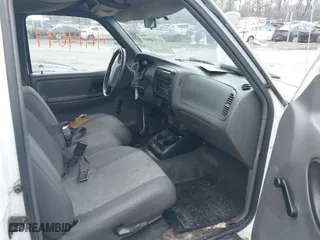 2001 Ford Ranger XL with VIN 1FTYR10U21TB03387, listed as a IAAI auction lot 41114097 with 275650 miles. Bid and sale history available at carsss.com. Image 5.