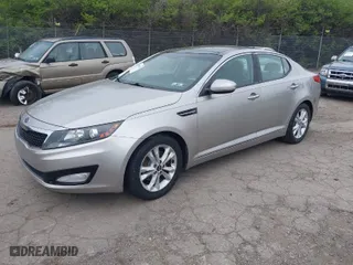 2011 Kia Optima EX with VIN KNAGN4A78B5127441, listed as a IAAI auction lot 41995129 with 57,145 mi miles. Bid and sale history available at carsss.com. Image 2.