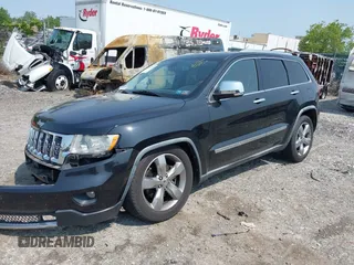 2011 Jeep Grand Cherokee Overland with VIN 1J4RR6GT3BC574037, listed as a IAAI auction lot 42411532 with 158,765 mi miles and . Bid and sale history available at DreamBid. Image 2.