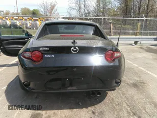2021 Mazda MX-5 Miata Grand Touring z VIN JM1NDAM75M0451597, wystawiony jako IAAI lot #41932712 z przebiegiem 61 710 mil mil oraz . Historia ofert i sprzedaży dostępna na DreamBid. Obrazek 16.