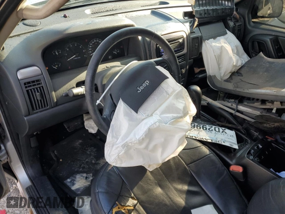 2004 Jeep Grand Cherokee Laredo z VIN 1J4GW48S84C200617, wystawiony jako Copart lot #51732045 z przebiegiem 171 452 mil mil oraz Nie do naprawy • Non repairable. Historia ofert i sprzedaży dostępna na DreamBid. Obrazek 8.