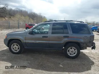 2004 Jeep Grand Cherokee Laredo z VIN 1J4GW48SX4C213322, wystawiony jako IAAI lot #41969362 z przebiegiem 273 876 mil mil oraz . Historia ofert i sprzedaży dostępna na DreamBid. Obrazek 14.