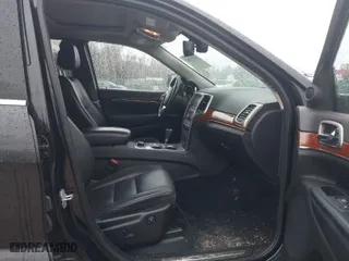 2013 Jeep Grand Cherokee Limited with VIN 1C4RJFBG0DC656382, listed as a IAAI auction lot 41870162 with 162,869 mi miles. Bid and sale history available at carsss.com. Image 5.
