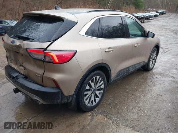 2021 Ford Escape Titanium Hybrid with VIN 1FMCU9DZXMUA66161, listed as a IAAI auction lot 41208651 with 61,198 mi miles and . Bid and sale history available at DreamBid. Image 4.