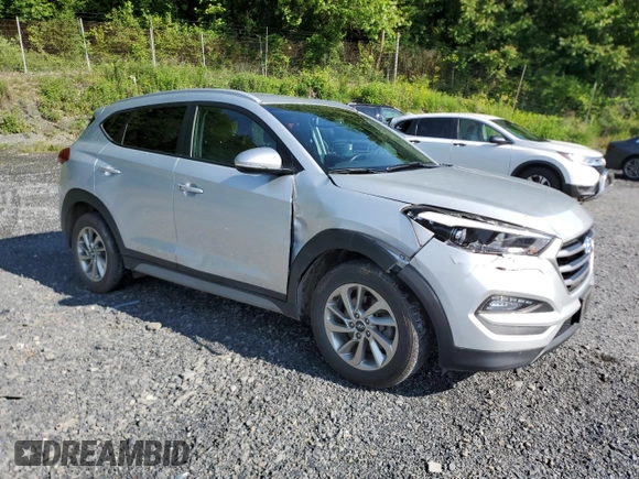2018 Hyundai Tucson SEL with VIN KM8J3CA49JU666942, listed as a Copart auction lot 58911095 with 73,839 mi miles and Salvage title. Bid and sale history available at DreamBid. Image 4.