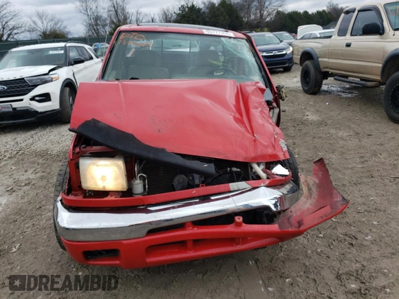 1999 Nissan Frontier XE with VIN 1N6ED26Y4XC313142, listed as a Copart auction lot 85777354 with 122,822 mi miles and Salvage title. Bid and sale history available at DreamBid. Image 5.