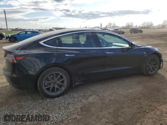 2019 Tesla Model 3 Mid Range z VIN 5YJ3E1EA7KF420025, wystawiony jako Copart lot #56149015 z przebiegiem 253 771 mil mil oraz Szkoda całkowita • Salvage title. Historia ofert i sprzedaży dostępna na DreamBid. Obrazek 3.