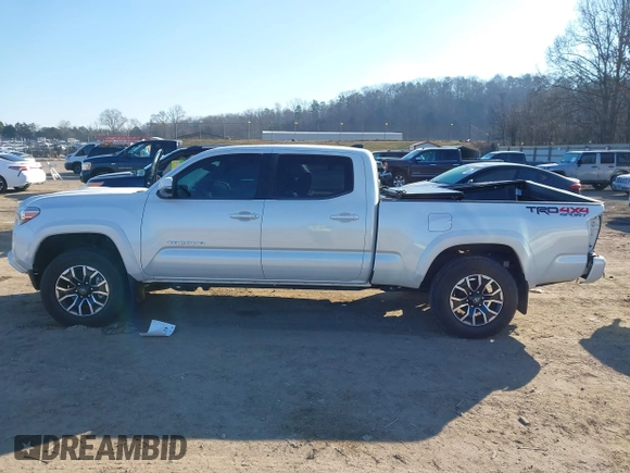 2021 Toyota Tacoma 4WD SR5 with VIN 3TYDZ5BN3MT001860, listed as a IAAI auction lot 41269423 with 23,378 mi miles. Bid and sale history available at carsss.com. Image 14.