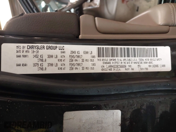 2011 Jeep Grand Cherokee 70th Anniversary with VIN 1J4RR4GG3BC566690, listed as a IAAI auction lot 41810545 with 173,886 mi miles. Bid and sale history available at carsss.com. Image 9.