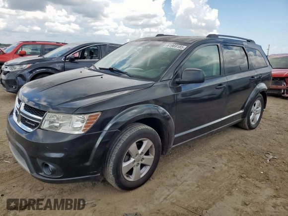 2012 Dodge Journey SXT with VIN 3C4PDCBG9CT208187, listed as a Copart auction lot 61969185 with 156,295 mi miles and Salvage title. Bid and sale history available at DreamBid. Image 1.