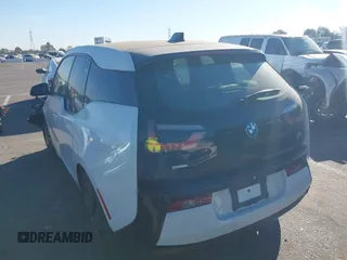 2014 BMW i3 with VIN WBY1Z4C57EV276810, listed as a IAAI auction lot 41370310 with Not provided miles and . Bid and sale history available at DreamBid. Image 3.