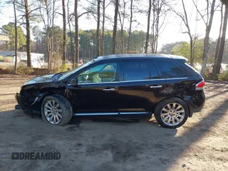 2013 Lincoln MKX with VIN 2LMDJ6JK8DBL60753, listed as a IAAI auction lot 41760954 with 121,714 mi miles. Bid and sale history available at carsss.com. Image 14.