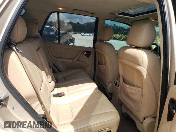 2002 Mercedes-Benz M-Class with VIN 4JGAB54E72A322046, listed as a Copart auction lot 74393084 with 128,015 mi miles and Salvage Title. Bid and sale history available at carsss.com. Image 11.
