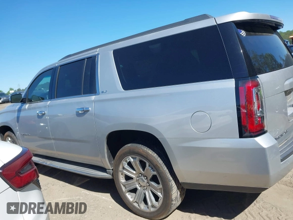 2015 GMC Yukon XL SLT with VIN 1GKS1HKC8FR221608, listed as a IAAI auction lot 42044318 with 215,757 mi miles. Bid and sale history available at carsss.com. Image 14.