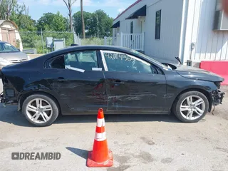 2015 Volvo S60 T5 Drive-E Premier with VIN YV140MFK6F1346875, listed as a IAAI auction lot 42004365 with 98,574 mi miles and . Bid and sale history available at DreamBid. Image 14.