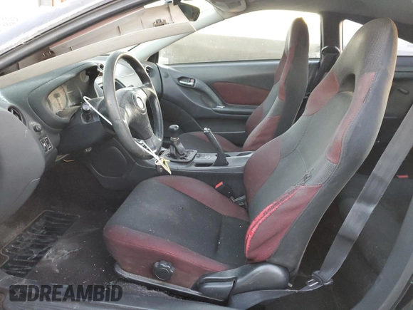 2004 Toyota Celica GT with VIN JTDDR32T040168744, listed as a Copart auction lot 85504754 with 210,919 mi miles and Clean Title. Bid and sale history available at DreamBid. Image 7.