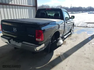2010 Dodge Ram 1500 Sport with VIN 3D7JV1ET4AG183565, listed as a IAAI auction lot 41261584 with 124,281 mi miles. Bid and sale history available at carsss.com. Image 4.