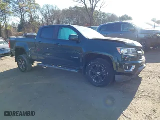 2015 Chevrolet Colorado 4WD Z71 with VIN 1GCGTCE31F1163947, listed as a IAAI auction lot 40997814 with 101,884 mi miles. Bid and sale history available at carsss.com. Image 1.