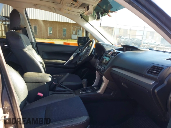 2015 Subaru Forester 2.0XT Premium with VIN JF2SJGDC2FH532994, listed as a IAAI auction lot 41797117 with 104,571 mi miles. Bid and sale history available at carsss.com. Image 5.