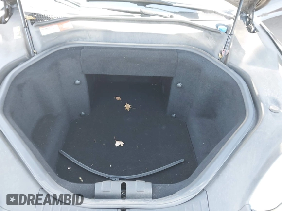 2014 Tesla Model S 60 z VIN 5YJSA1H19EFP45024, wystawiony jako IAAI lot #41960222 z przebiegiem 108 573 mil mil oraz . Historia ofert i sprzedaży dostępna na DreamBid. Obrazek 10.