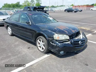 2002 Nissan Maxima GLE z VIN JN1DA31AX2T325038, wystawiony jako IAAI lot #42250279 z przebiegiem 169 555 mil mil oraz . Historia ofert i sprzedaży dostępna na DreamBid. Obrazek 1.