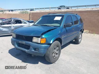 1998 Isuzu Rodeo S z VIN 4S2CM58W8W4328196, wystawiony jako IAAI lot #42323556 z przebiegiem 272 915 mil mil oraz . Historia ofert i sprzedaży dostępna na DreamBid. Obrazek 2.