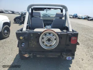 1990 Jeep Wrangler with VIN 2J4FY29T8LJ541585, listed as a Copart auction lot 54352634 with 138,022 mi miles and Salvage Title. Bid and sale history available at carsss.com. Image 6.