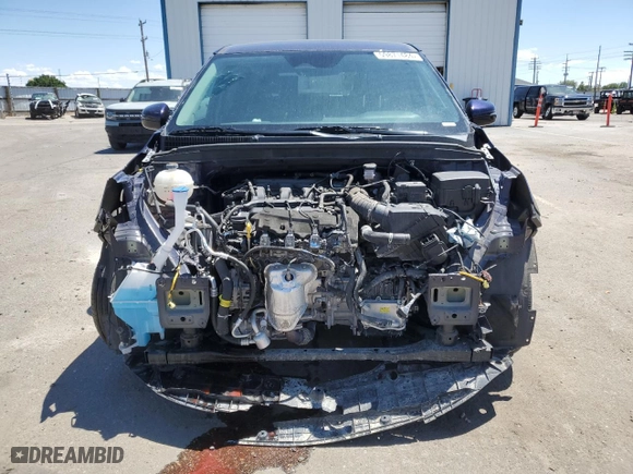 2022 Kia Carnival LXS with VIN KNDNB4H3XN6173633, listed as a Copart auction lot 59871484 with 21,822 mi miles and Salvage Title. Bid and sale history available at carsss.com. Image 5.