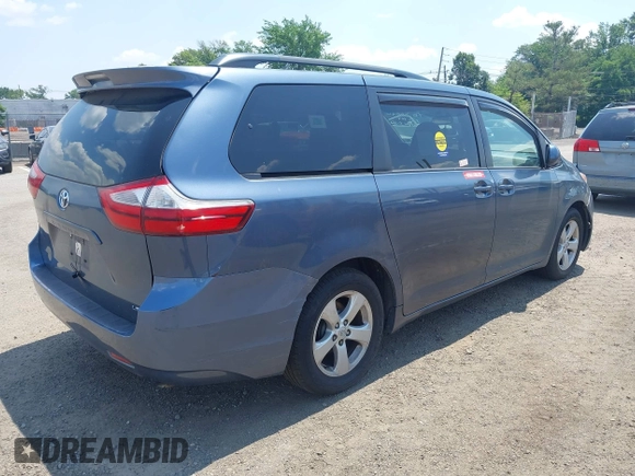 2015 Toyota Sienna LE AAS with VIN 5TDKK3DC1FS642029, listed as a IAAI auction lot 42618738 with 201,344 mi miles and . Bid and sale history available at DreamBid. Image 4.