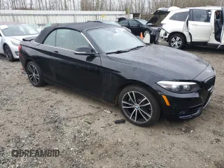 2020 BMW 2 Series 230i xDrive with VIN WBA2K1C08L7F94997, listed as a Copart auction lot 43188415 with 64,545 mi miles and Salvage Title. Bid and sale history available at carsss.com. Image 4.