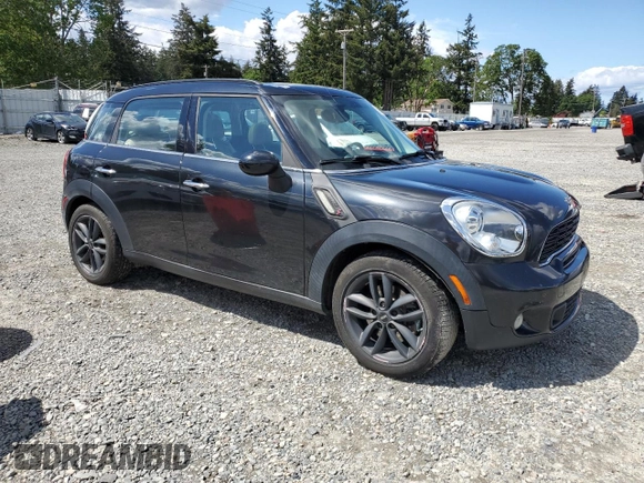 2013 MINI Countryman S ALL4 z VIN WMWZC5C56DWP33270, wystawiony jako Copart lot #56804085 z przebiegiem 141 637 mil mil oraz Szkoda całkowita • Salvage title. Historia ofert i sprzedaży dostępna na DreamBid. Obrazek 4.