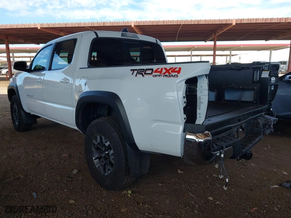 2023 Toyota Tacoma 4WD SR with VIN 3TMCZ5AN8PM650793, listed as a IAAI auction lot 41664712 with 9,427 mi miles. Bid and sale history available at carsss.com. Image 3.