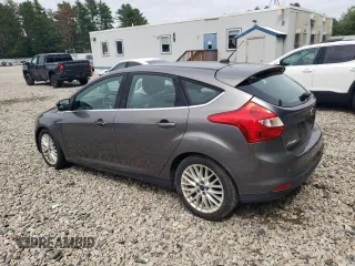 2014 Ford Focus Titanium z VIN 1FADP3N23EL365678, wystawiony jako Copart lot #64418025 z przebiegiem Nie podano mil oraz Czysty tytuł • Clean title. Historia ofert i sprzedaży dostępna na DreamBid. Obrazek 2.