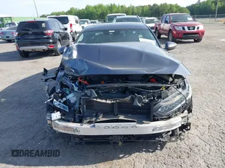 2020 Honda Accord Touring with VIN 1HGCV3F90LA013434, listed as a IAAI auction lot 42075502 with 56,645 mi miles and . Bid and sale history available at DreamBid. Image 13.