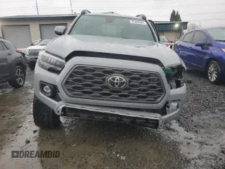 2021 Toyota Tacoma SR with VIN 3TMCZ5AN0MM395357, listed as a Copart auction lot 87086684 with 48,664 mi miles and Salvage title. Bid and sale history available at DreamBid. Image 5.