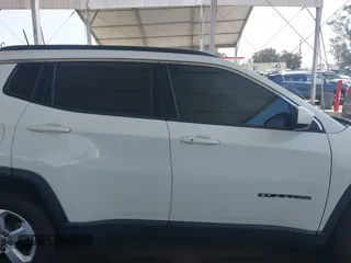 2020 Jeep Compass Latitude with VIN 3C4NJCBB8LT141375, listed as a IAAI auction lot 42382374 with 63,799 mi miles and . Bid and sale history available at DreamBid. Image 14.