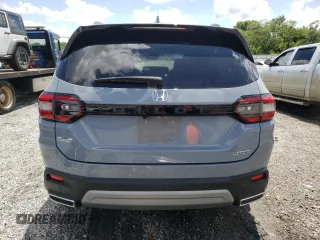 2023 Honda Pilot Touring with VIN 5FNYG2H78PB006054, listed as a Copart auction lot 56039785 with 35,831 mi miles and Salvage title. Bid and sale history available at DreamBid. Image 6.