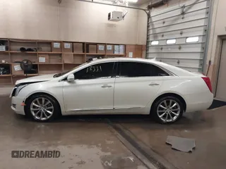 2013 Cadillac XTS Luxury with VIN 2G61R5S37D9152726, listed as a IAAI auction lot 41718331 with 88,189 mi miles and . Bid and sale history available at DreamBid. Image 13.