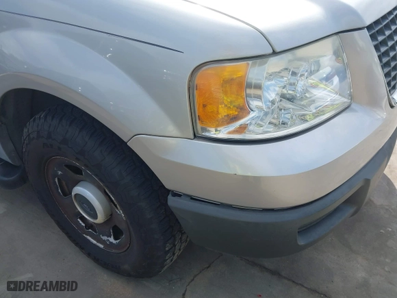 2004 Ford Expedition XLS with VIN 1FMRU13W64LB51765, listed as a IAAI auction lot 41760670 with 84,333 mi miles. Bid and sale history available at carsss.com. Image 21.