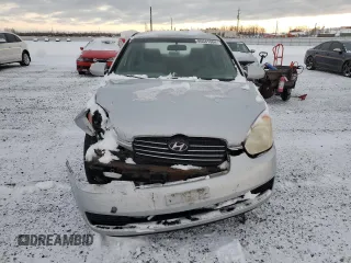 2007 Hyundai Accent GL z VIN KMHCN45CX7U127037, wystawiony jako Copart lot #86041984 z przebiegiem 212 828 mil mil oraz Szkoda całkowita • Salvage title. Historia ofert i sprzedaży dostępna na DreamBid. Obrazek 5.