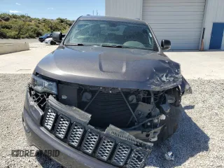 2018 Jeep Grand Cherokee Altitude with VIN 1C4RJFAG5JC320742, listed as a Copart auction lot 56988195 with 140,320 mi miles and Salvage title. Bid and sale history available at DreamBid. Image 5.