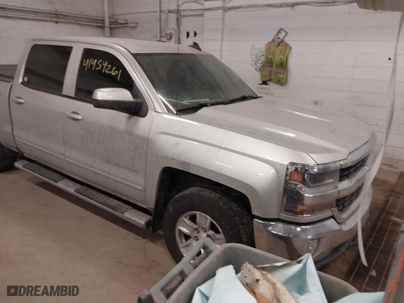 2016 Chevrolet Silverado 1500 LT with VIN 3GCUKRECXGG228726, listed as a IAAI auction lot 41454261 with 133,464 mi miles. Bid and sale history available at carsss.com. Image 1.