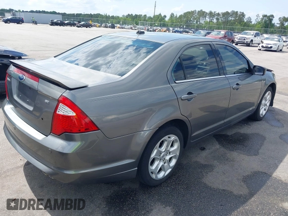 2010 Ford Fusion SE with VIN 3FAHP0HAXAR165167, listed as a IAAI auction lot 42148887 with 332,598 mi miles and . Bid and sale history available at carsss.com. Image 4.