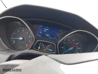 2014 Ford Focus SE with VIN 1FADP3F22EL395592, listed as a IAAI auction lot 41915197 with 103,537 mi miles. Bid and sale history available at carsss.com. Image 7.