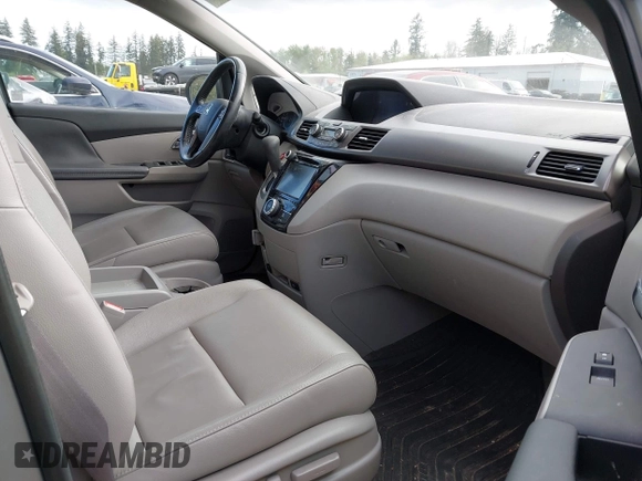 2016 Honda Odyssey EX-L with VIN 5FNRL5H60GB070789, listed as a IAAI auction lot 42148249 with 64,691 mi miles. Bid and sale history available at carsss.com. Image 5.
