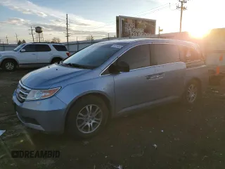 2012 Honda Odyssey EX-L with VIN 5FNRL5H64CB002814, listed as a Copart auction lot 44134505 with 131,235 mi miles and Salvage Title. Bid and sale history available at carsss.com. Image 1.