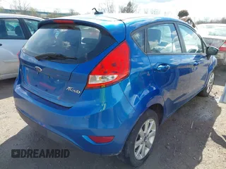 2011 Ford Fiesta SE with VIN 3FADP4EJ0BM173576, listed as a IAAI auction lot 42075691 with 128,835 mi miles. Bid and sale history available at carsss.com. Image 4.