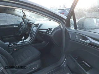 2015 Ford Fusion SE Hybrid with VIN 3FA6P0LU1FR219908, listed as a IAAI auction lot 41272688 with 310,452 mi miles. Bid and sale history available at carsss.com. Image 5.