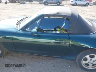 1999 Mazda MX-5 Miata with VIN JM1NB3537X0109618, listed as a IAAI auction lot 41795736 with 160,452 mi miles and . Bid and sale history available at DreamBid. Image 15.